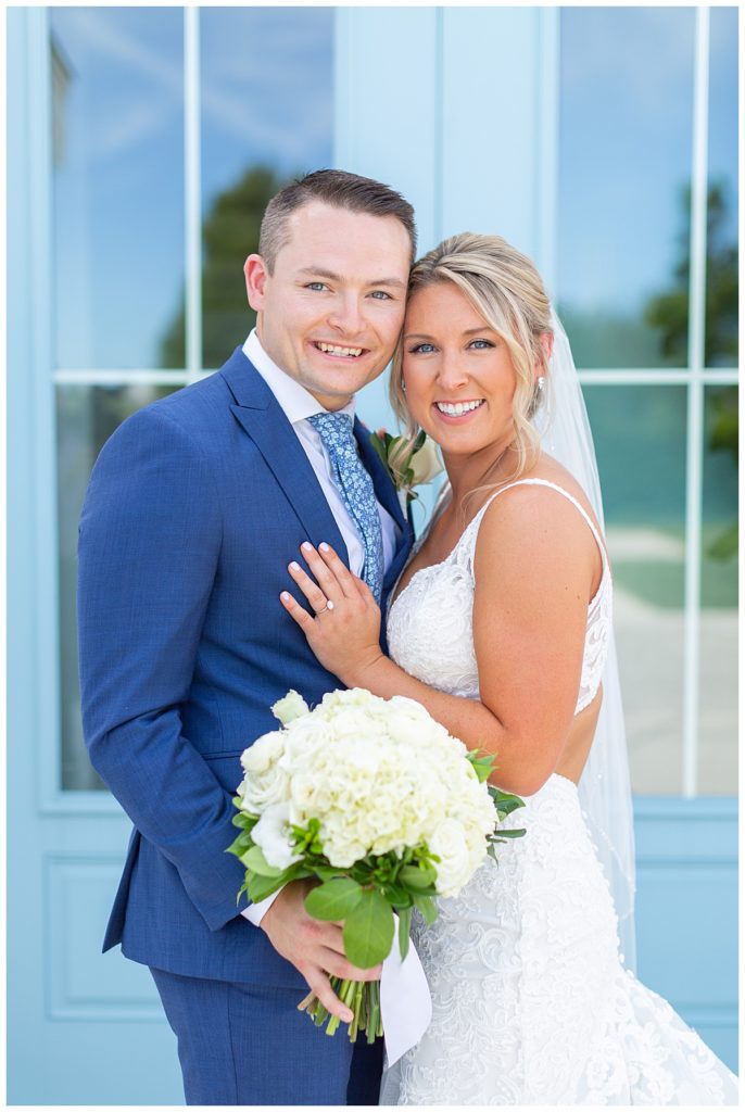 Bride and Groom smiling at Belle Mer Island House Wedding Ceremony