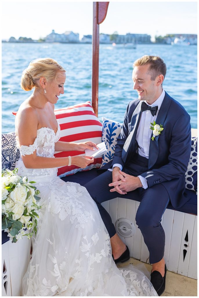 bride and groom say private vows on rented yacht