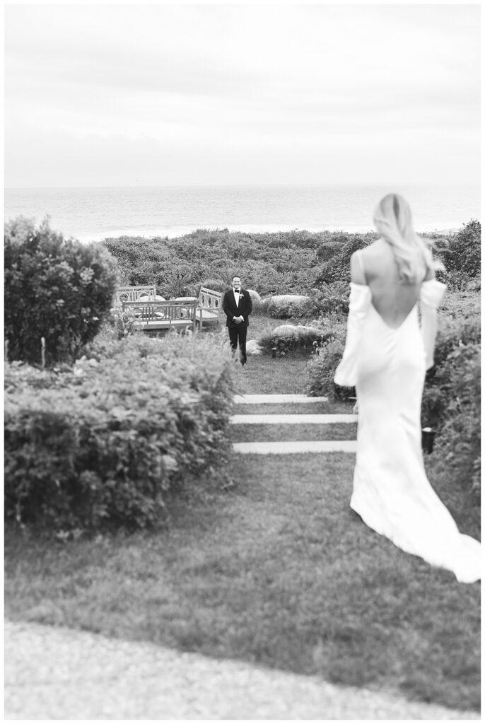 Groom waits for Bride in the herb garden at the Ocean House